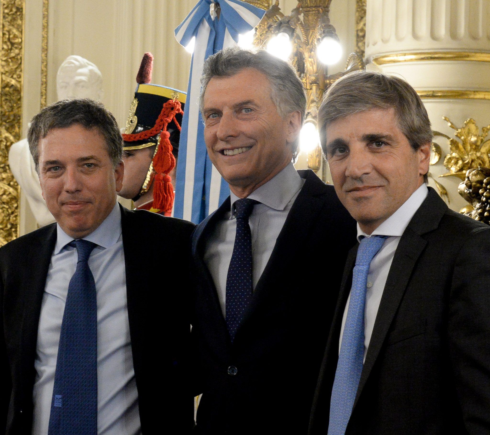 Nicolás Dujovne, Mauricio Macri y Luis Caputo<br>
