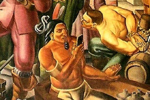 Un nativo estadounidense sostiene un aparato similar a un iPhone