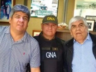 El comandante Saldaño junto a Hugo y Pablo Moyano El comandante Saldaño junto a Hugo y Pablo Moyano