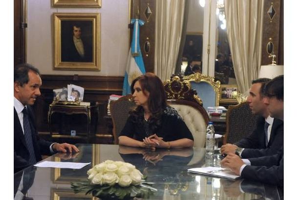 Daniel Scioli y Hernán Lorenzino con la Presidente