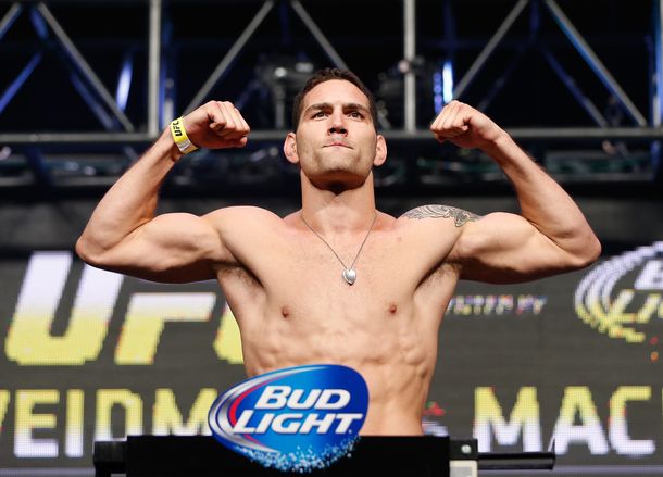 Weidman y Rousey retuvieron sus cinturones en el UFC 175