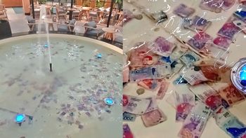 Increíble imagen viral en Rosario: tiran billetes a una fuente por la inflación Increíble imagen viral en Rosario: tiran billetes a una fuente por la inflación