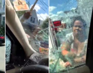 Una mujer rompe el auto de su marido con un martillo con sus hijos adentro