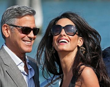 George Clooney  y su mujer