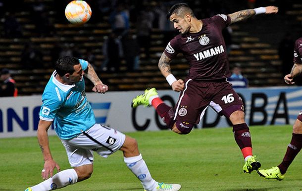 Belgrano y Lanús igualaron con goles al principio y al final del partido