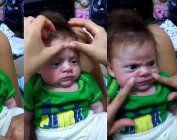 Un bebé está tan enojado que no puede sonreír