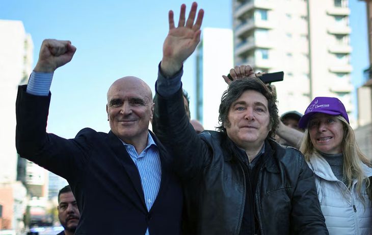 José Luis Espert junto a Javier y Karina Milei.