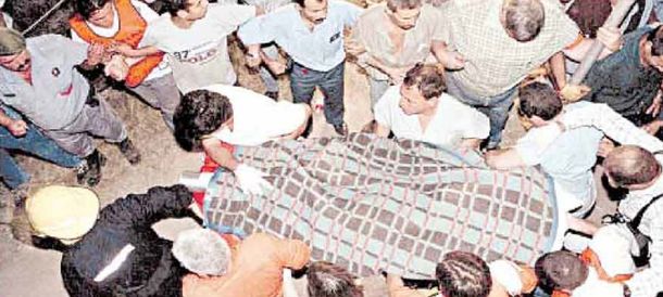 Así retiraban el cuerpo de Cristian