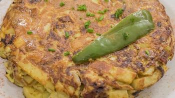 Ubicado en Caballito, este bodegón prepara la mejor tortilla de papas de la ciudad. Ubicado en Caballito, este bodegón prepara la mejor tortilla de papas de la ciudad.