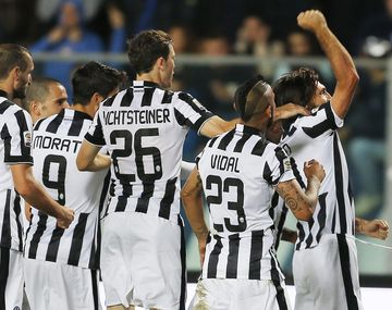 Con Tevez como titular