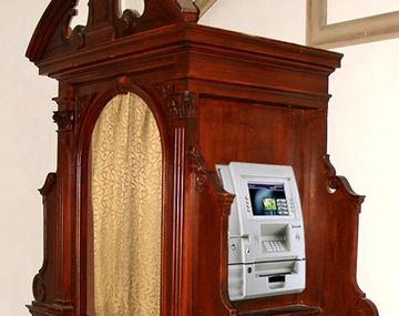Confesionario cajero automático