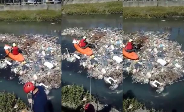 El duro rescate de un perrito en medio de un arroyo