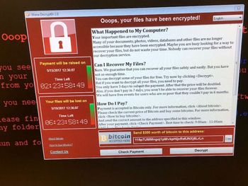 Este es el cartel que aparece cuando te hackea el virus