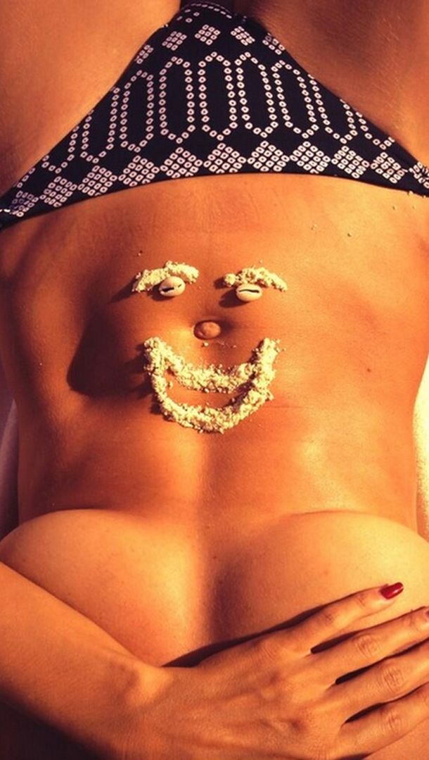 Heidi Klum jugó en la playa sobre su escultural cuerpo