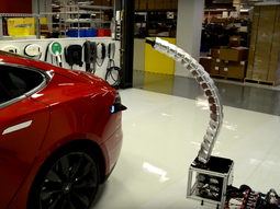 tesla presenta un cargador serpiente automatico para autos electricos tesla presenta un cargador serpiente automatico para autos electricos