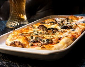 Abono post mortem: dónde comer pizza y pagarla después de muerto