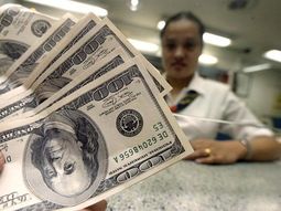 el dolar oficial subio un centavo y el ilegal retrocedio a $9,14 el dolar oficial subio un centavo y el ilegal retrocedio a $9,14