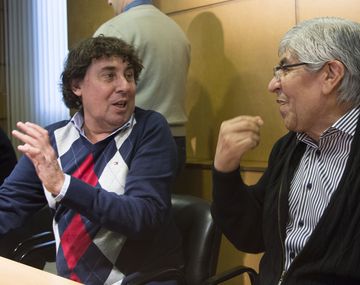 Pablo Micheli y Hugo Moyano