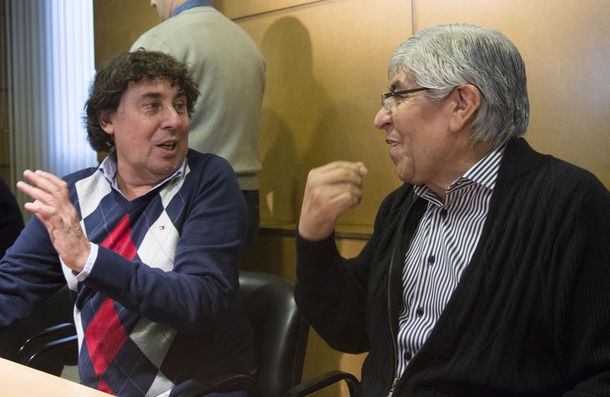 Pablo Micheli y Hugo Moyano