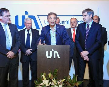 Francisco Cabrera y Marcos Peña con la UIA en 2016