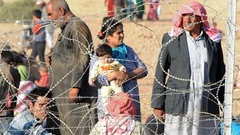 perseguidos por el estado islamico, 60 mil kurdos huyeron de siria a turquia perseguidos por el estado islamico, 60 mil kurdos huyeron de siria a turquia