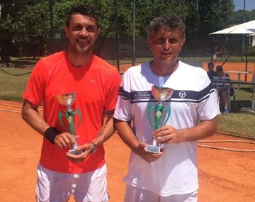 El ex defensor italiano junto a su entrenador y actual pareja de dobles