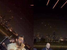 Video: una banda canta mientras de fondo se ven los misiles de Israel e Irán 