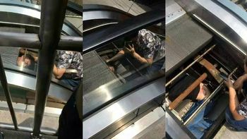 un hombre quedo atascado adentro de una escalera mecanica en china un hombre quedo atascado adentro de una escalera mecanica en china