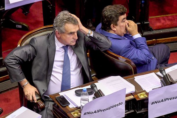 Agustín Rossi junto a Fernando Espinoza