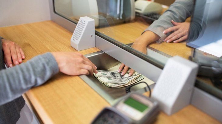 Bancarios cobrarán como mínimo una compensación de 64.500 pesos por su día