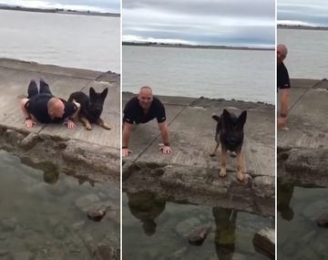 Un perro hace flexiones con un policía para concientizar sobre el sedentarismo