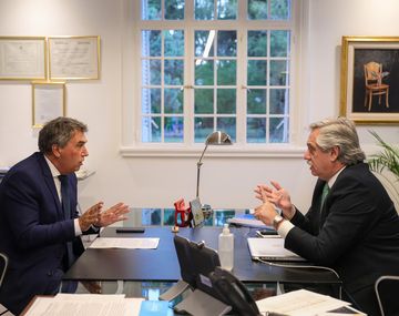 Alberto Fernández y Claudio Ambrosini, titular del Ente Nacional de Comunicaciones (Enacom).
