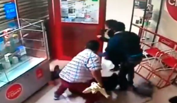 Salvaje robo a un local de celulares: una embarazada herida