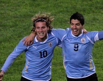 Diego Forlán y Luis Suárez