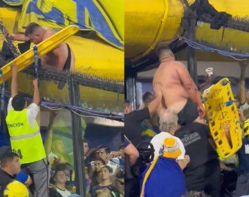 Video: el rescate de un hincha de Boca que quedó colgado del alambrado