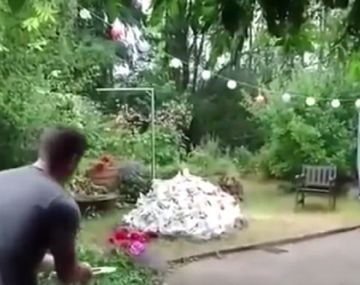 VIDEO: quiso quemar una montaña de basura pero destruyó el jardín