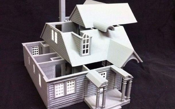 Cordobeses trabajan en una impresora que podría imprimir un hogar