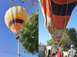 Un globo aerostático aterrizó en el patio de una casa