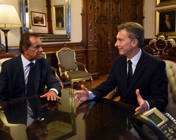 Scioli admitió que podría viajar junto a Macri