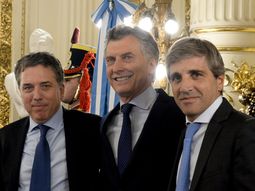 Nicolás Dujovne, Mauricio Macri y Luis Caputo