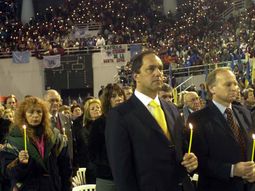 Scioli chupa cirios_Telam