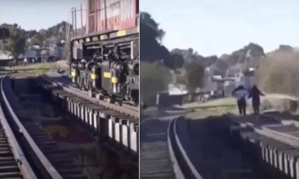 Peligroso desafío viral: caminaban por las vías y casi son arrolladas por el tren