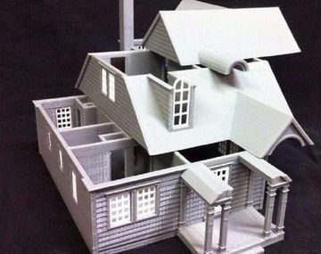 Cordobeses trabajan en una impresora que podría imprimir un hogar