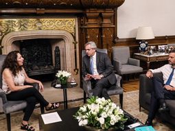 Cristina Caamaño, Alberto Fernández y Santiago Cafiero