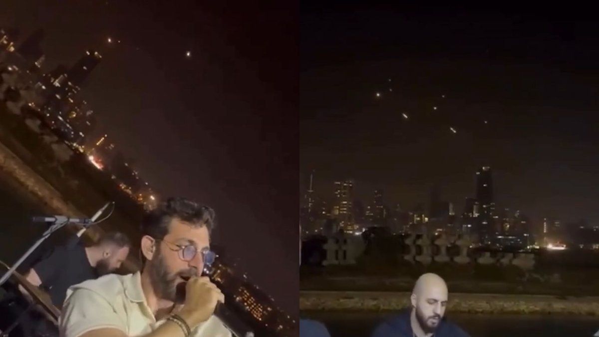 Líbano: una banda canta "Es una vida maravillosa" mientras de fondo se ven los misiles de Israel e Irán