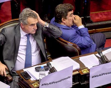 Agustín Rossi junto a Fernando Espinoza