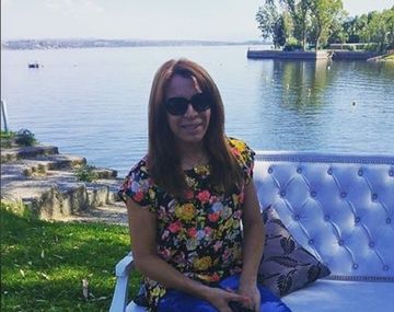 Lizy Tagliani en el baño de un gimnasio