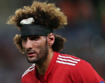 El belga Fellaini sorprendió a todos y le puso fin a su extravagante peinado