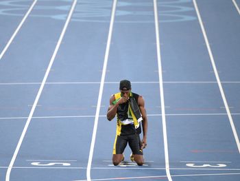 La novena medalla dorada del imparable Usain Bolt, en fotos