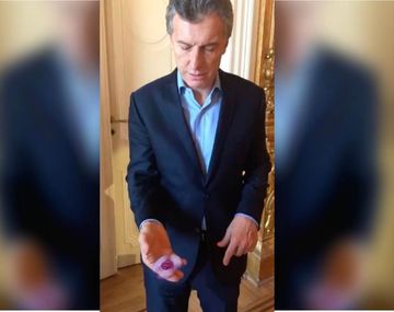 Macri jugando&nbsp;spinner